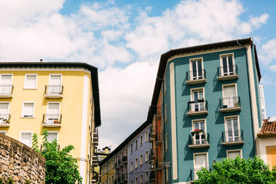 Low angle view of residential building against sky