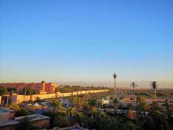 High angle view of buildings in city against clear sky