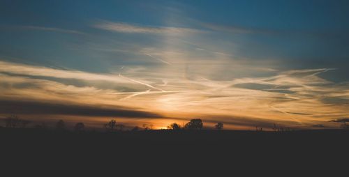 Scenic view of landscape at sunset