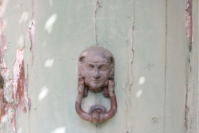 Close-up of old door knocker