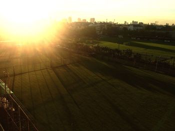 Scenic view of field against sky during sunset