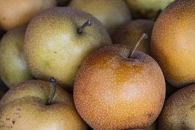 Close up pears on market stand