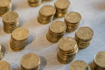 High angle view of coins on table