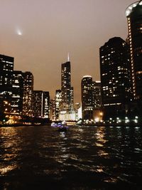 Illuminated cityscape at night