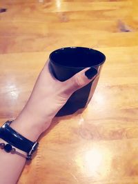 Close-up of hand holding drink