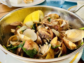 Clams in garlic sauce. cooked clams with parsley,mediterranean cuisine