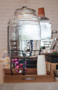 Close-up of glass jar on table at restaurant