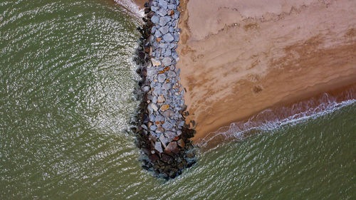 High angle view of surf on beach
