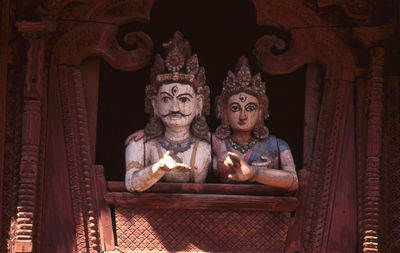 Statues of king and queen of the ancient kingdom of patan in kathmandu valley, nepal
