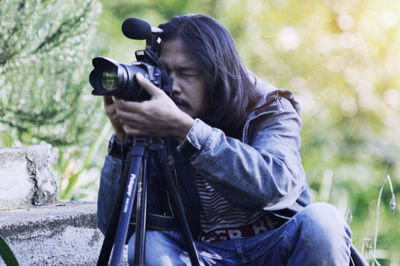 Portrait of man photographing