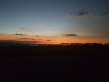 Scenic view of silhouette landscape against sky during sunset