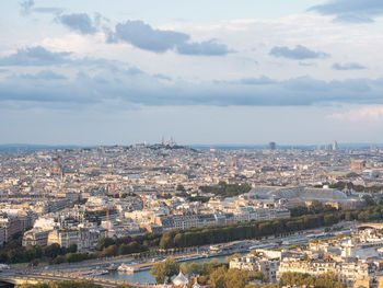Aerial view of cityscape against sky