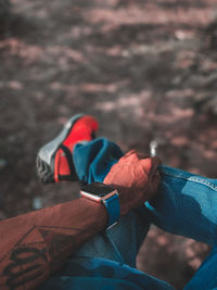 Close-up of man holding umbrella