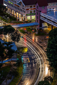 High angle view of light trails on road at night