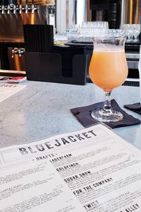 Close-up of beer glass on table