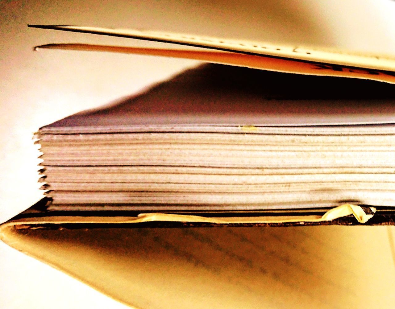 CLOSE-UP OF OPEN BOOK
