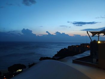 Scenic view of sea against sky at sunset