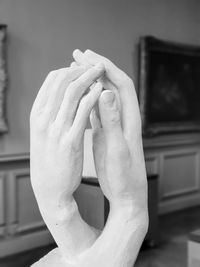 Close-up of hand holding sculpture