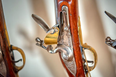 Close-up of faucet hanging on door