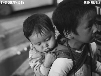 Close-up portrait of mother and son