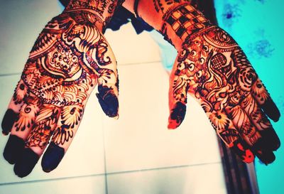 Midsection of woman with umbrella