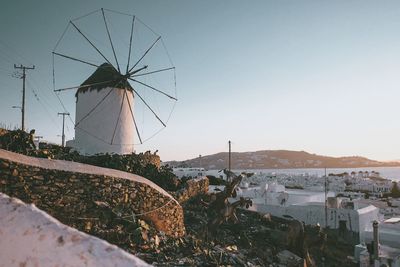 Traditional windmill against sky