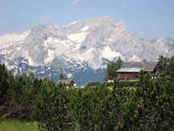 Scenic view of snowcapped mountains against sky