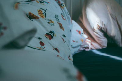 Person on bed at home