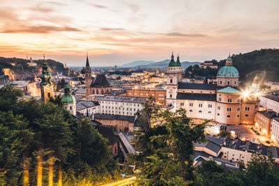 High angle view of townscape against sky at sunset