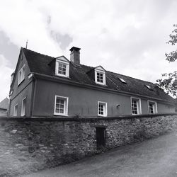 Low angle view of old building against sky