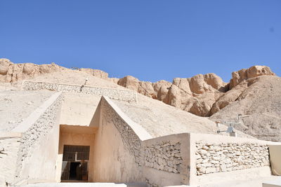 Panoramic view of historic building against clear blue sky