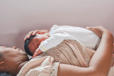Girl sleeping on bed