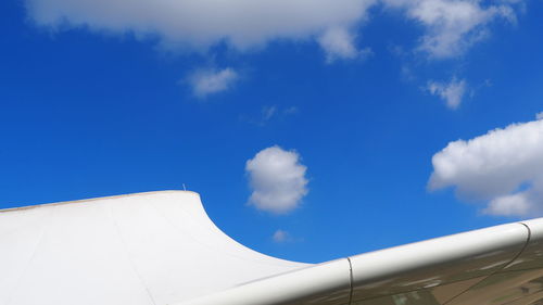 Low angle view of airplane against sky