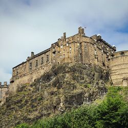 Edinburgh castle standing all high and mighty