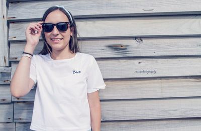 Portrait of young woman wearing sunglasses