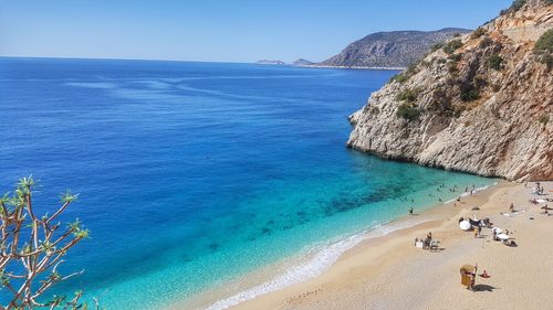 Scenic view of sea against clear blue sky