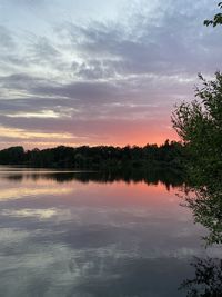 Scenic view of lake against sky during sunset