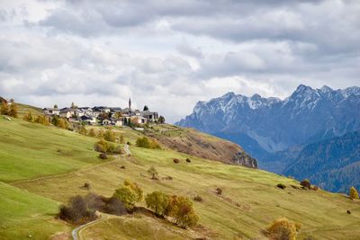 Scenic view of landscape and mountains against sky