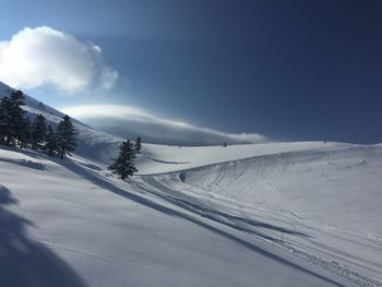 Snow covered mountain against sky