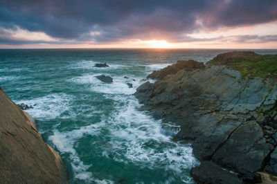 Scenic view of sea against sky during sunset