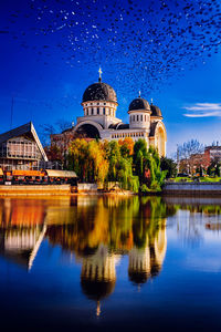 Reflection of buildings in lake