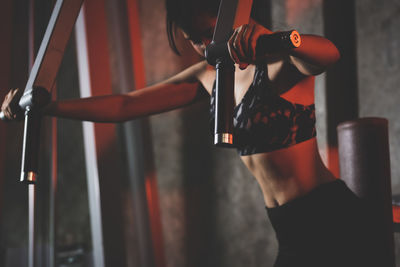 Woman exercising in gym