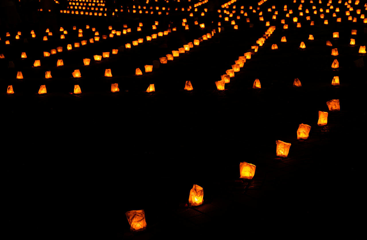 font, illuminated, lighting equipment, large group of objects, no people, night, celebration, lantern, orange color, darkness, tradition, in a row, light