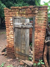 Close-up of mailbox on brick wall