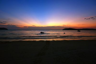 Scenic view of sea against sky during sunset