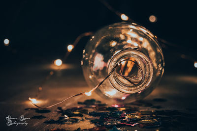 Close-up of illuminated light bulb