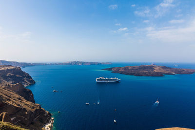 High angle view of sailboat on sea shore against sky