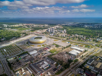 High angle view of buildings in city against sky
