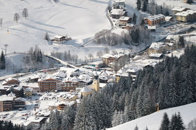 High angle view of buildings in city during winter