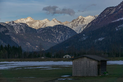 Scenic view of snowcapped mountains against sky